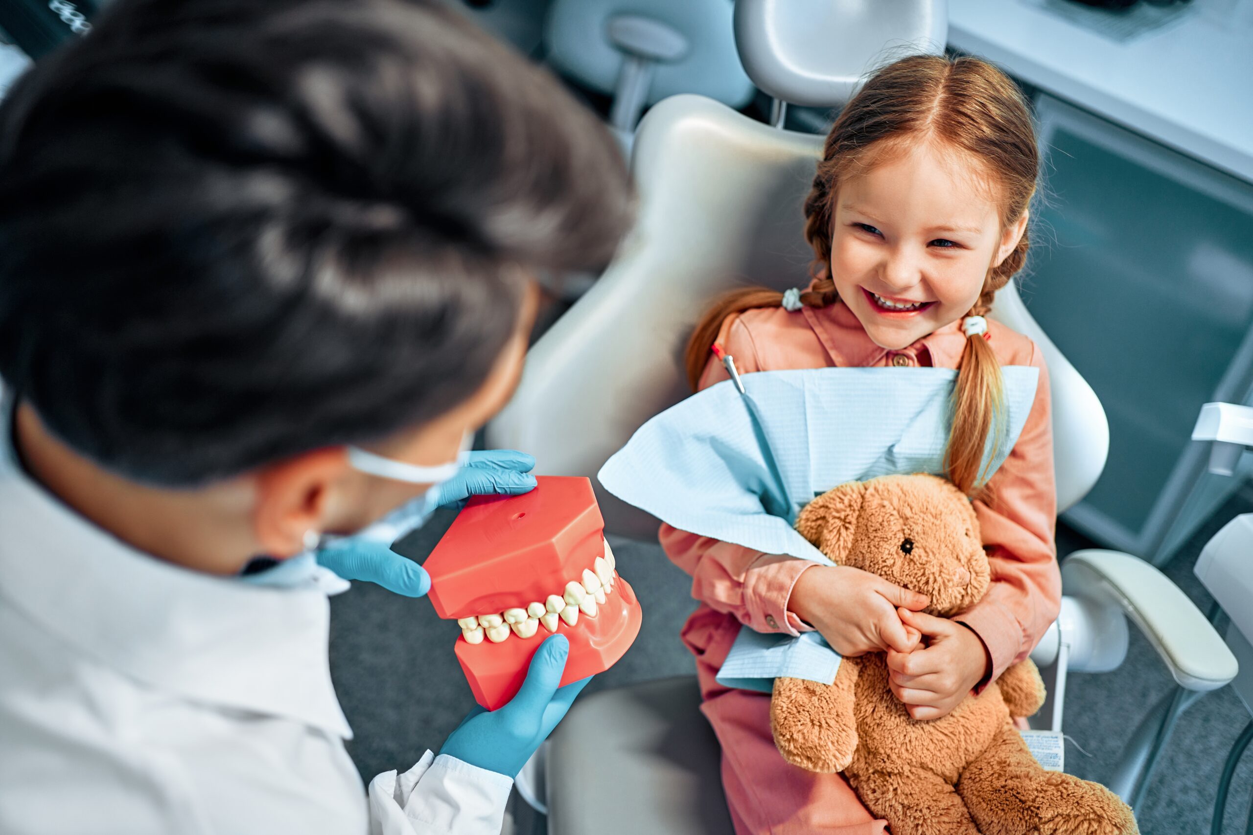 Kid with pediatric dentist