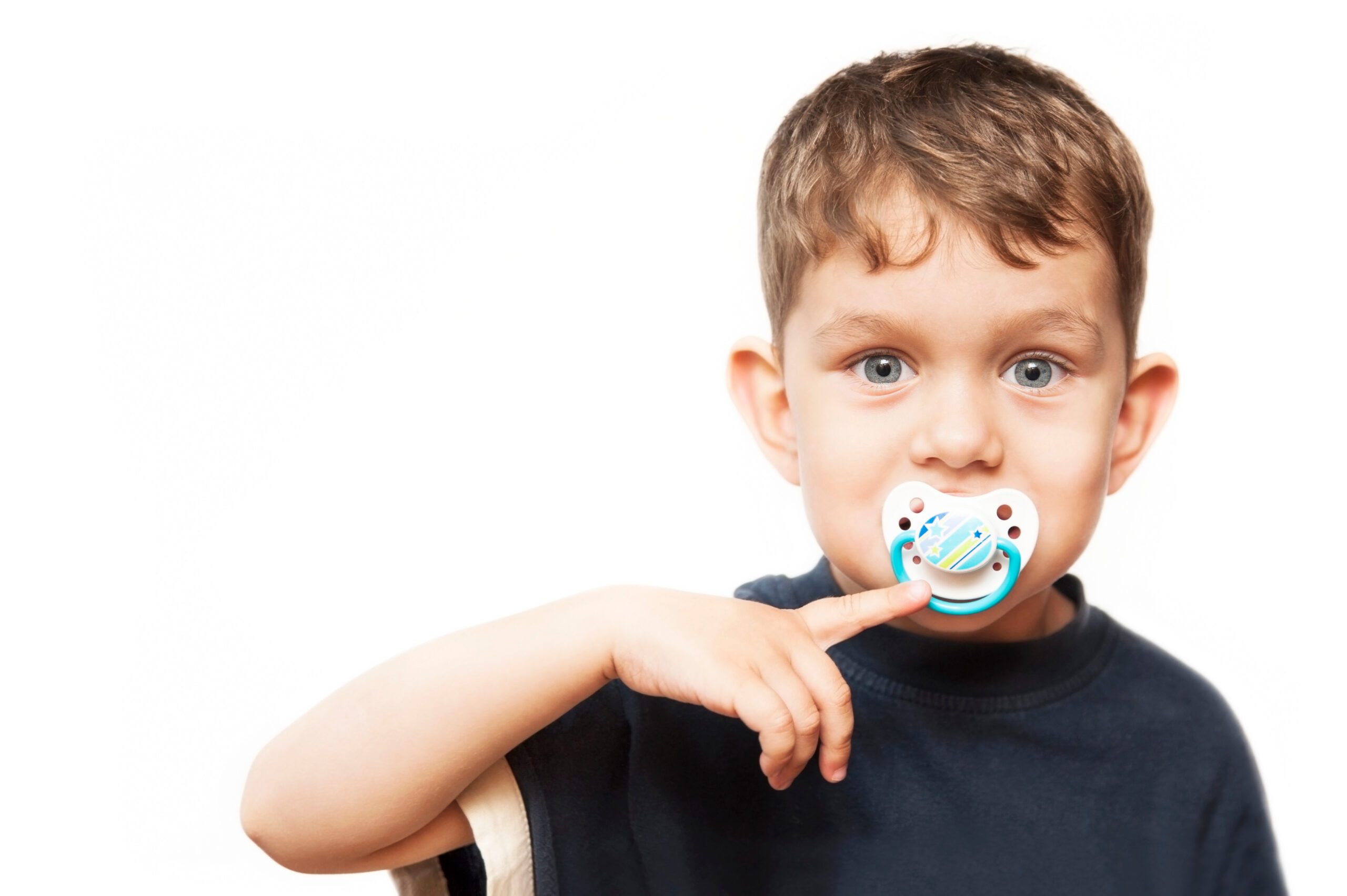Portrait,Of,A,Young,Boy,On,A,White,Background,With